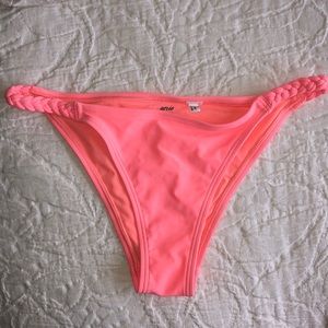 Bright pink bikini bottom.